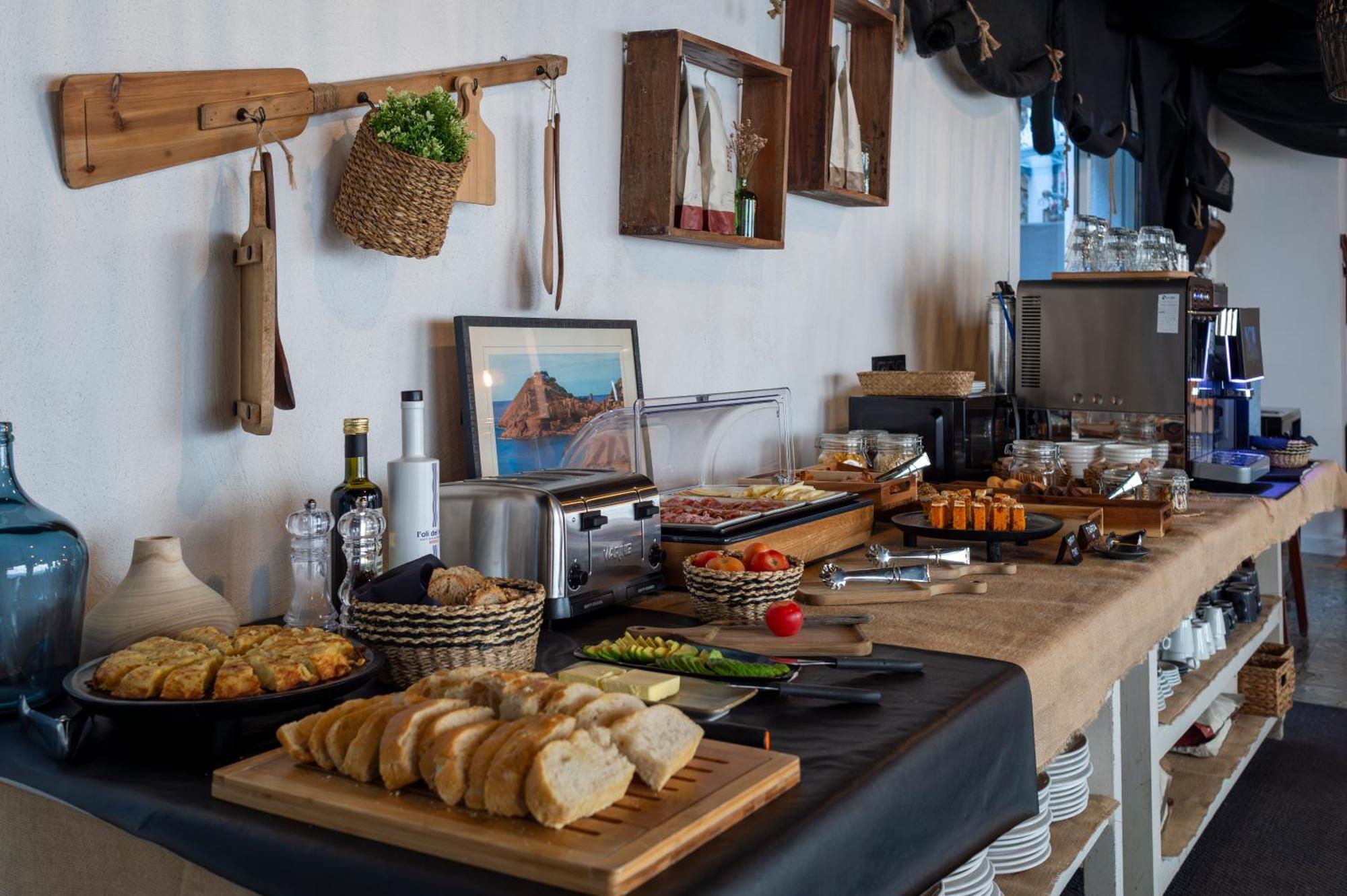 Hostal Boutique Es Menut 滨海托萨 外观 照片